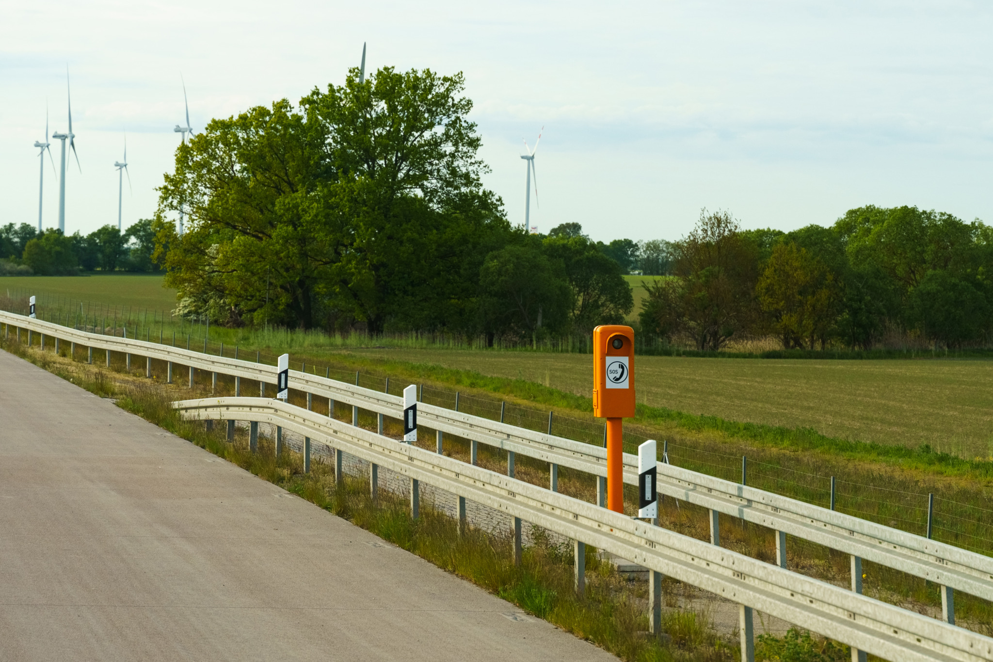 Road safety - orange SOS box on the motorway.